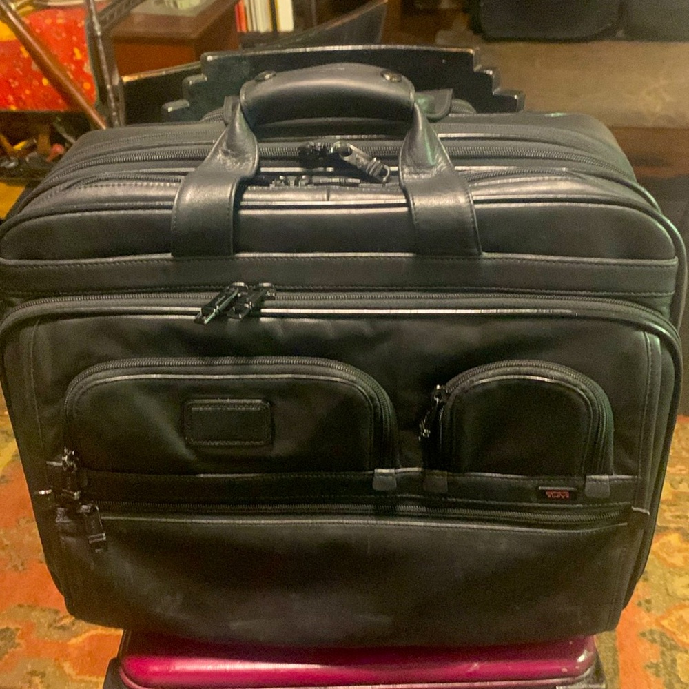 TUMI Napa leather 2-wheeled carry-on w/retractable handle